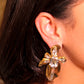 Aretes dorados y cristal