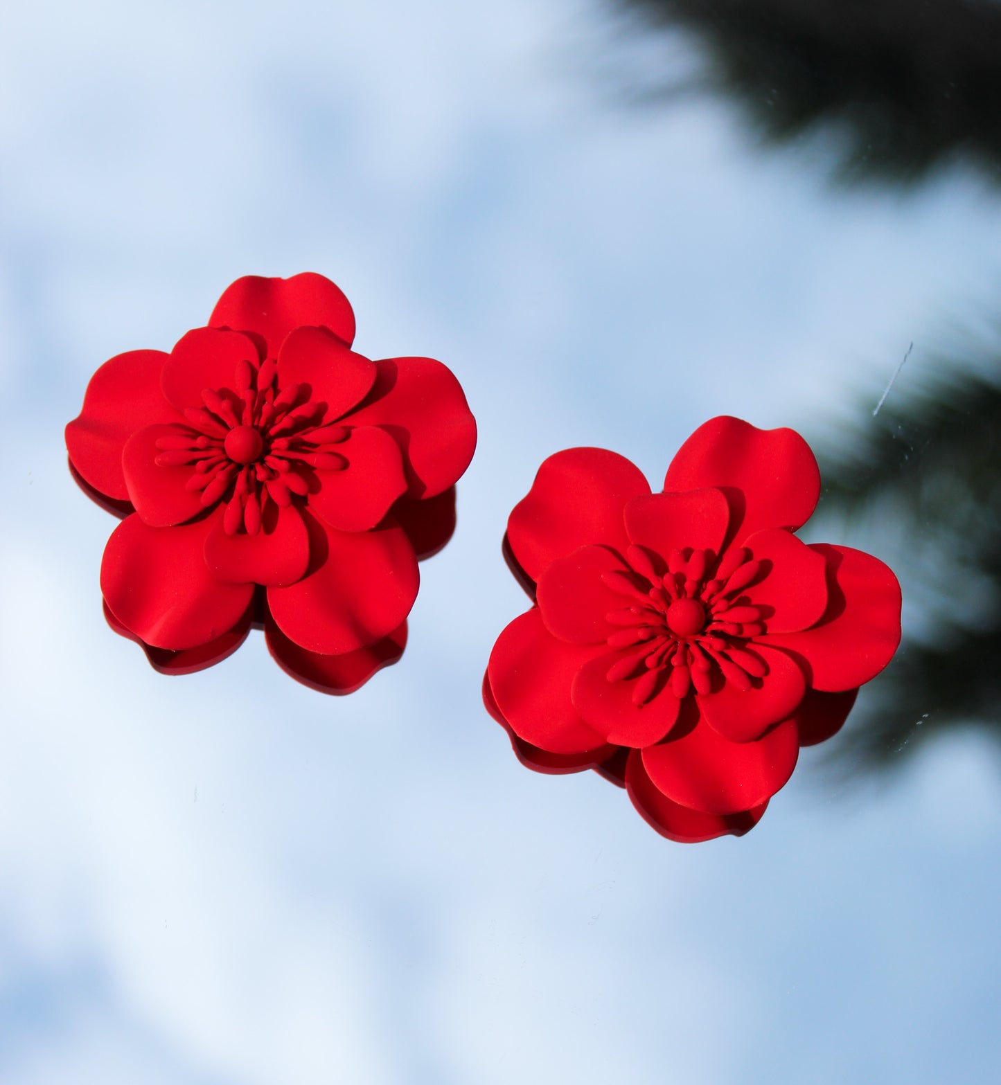 Aretes flor roja